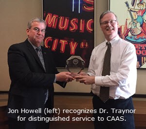 Howell_Gives_Award_to_Traynor_w_caption